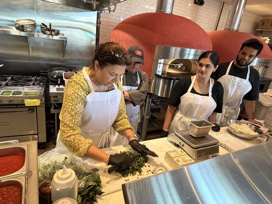 Hands-on fresh herb preparation in the Russo's kitchen