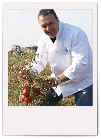 Chef Anthony Russo selecting fresh tomatoes