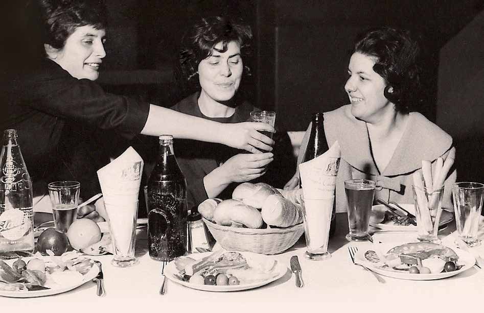 Historic Russo family gathering around an Italian table